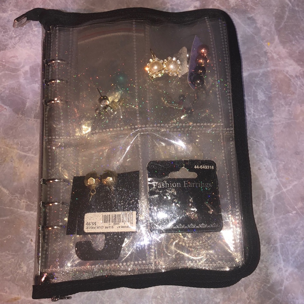 45 pair of earrings with a travel seperator booklet included